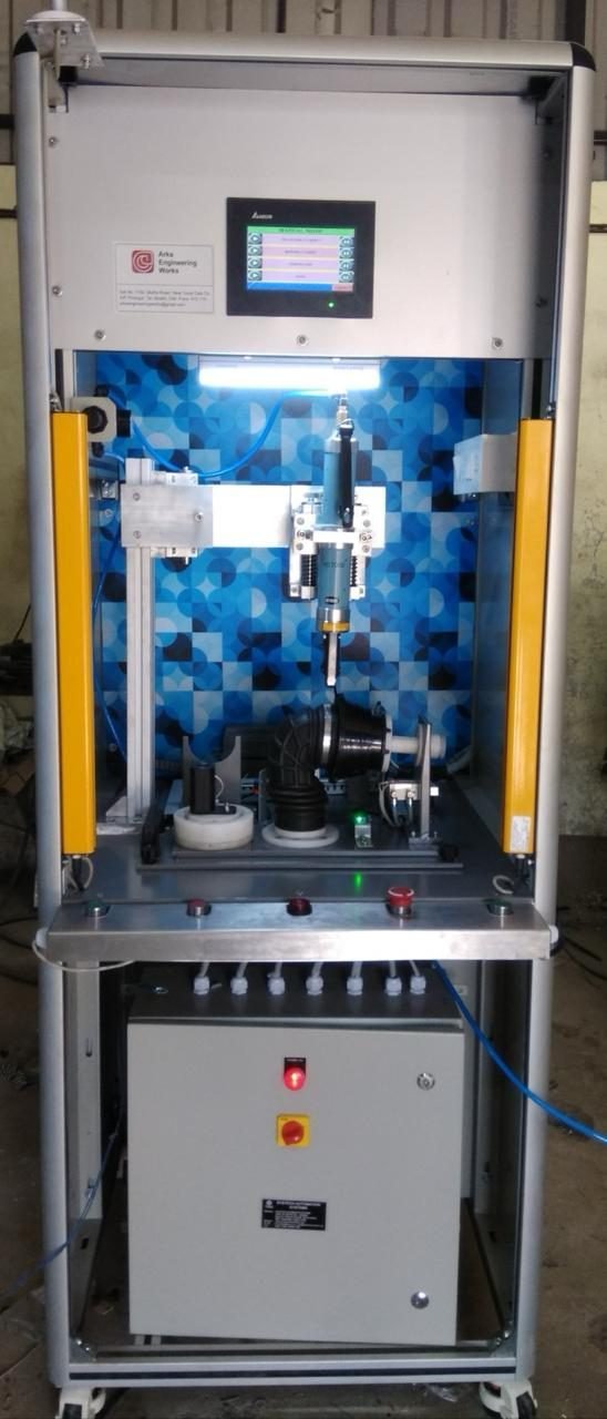 Compact assembly station with safety light curtain and pneumatic press head