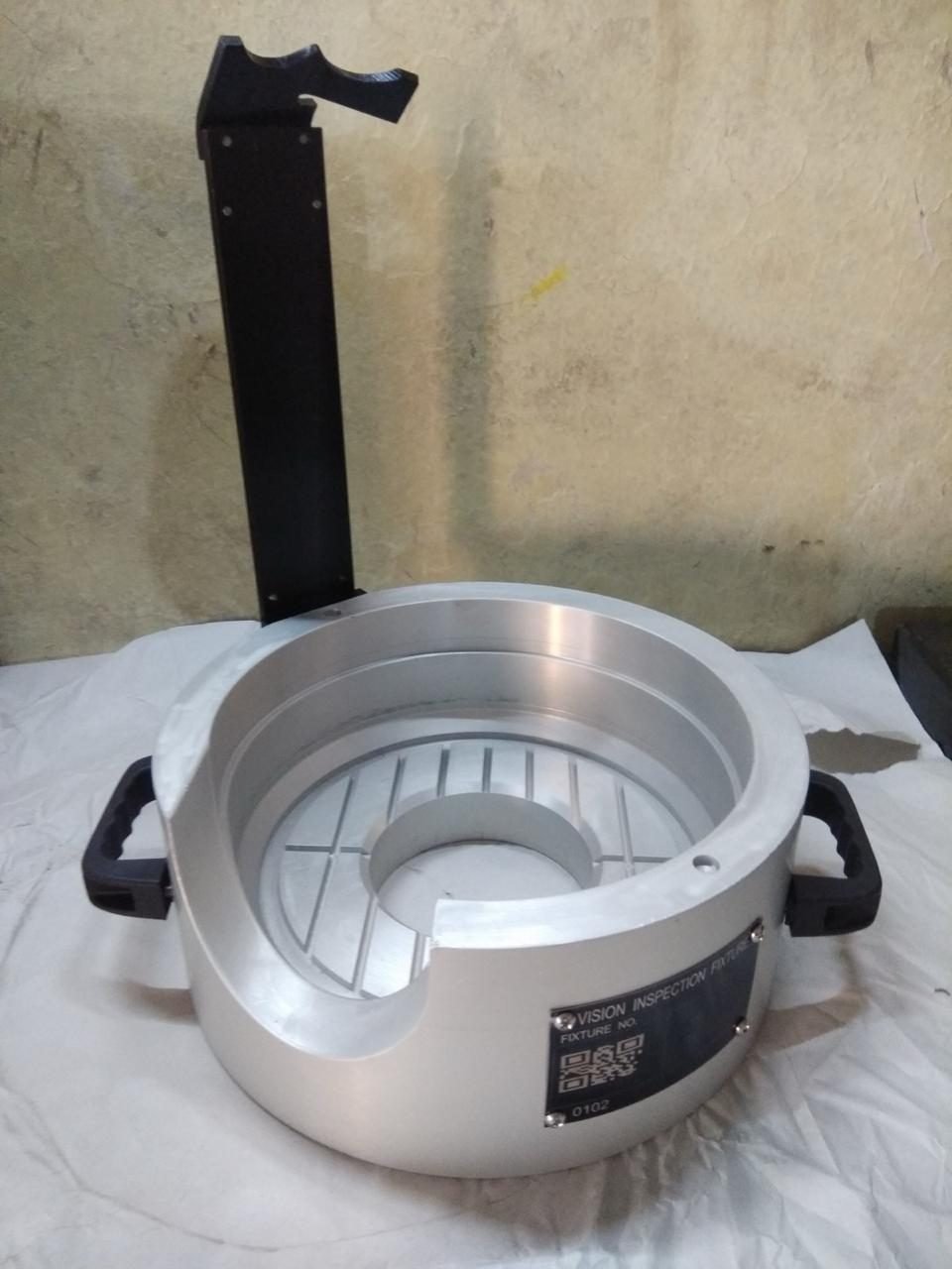 Aluminium fixture with handles and identification plate