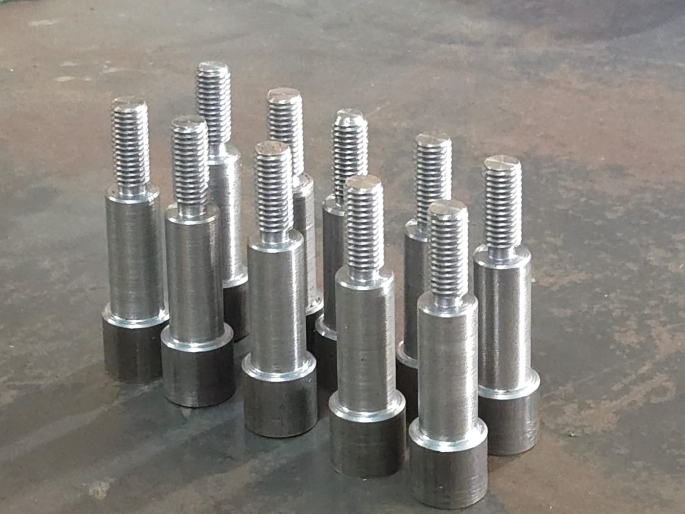 Stepped pins with threaded end